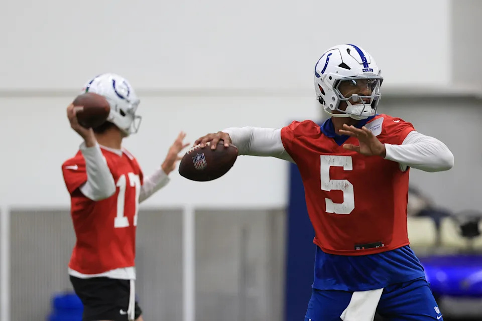 Sam Ehlinger (No. 5) and Jake Browning — observed here during OTAs in May — are engaged in a signal-caller contest at Colts training facility. 