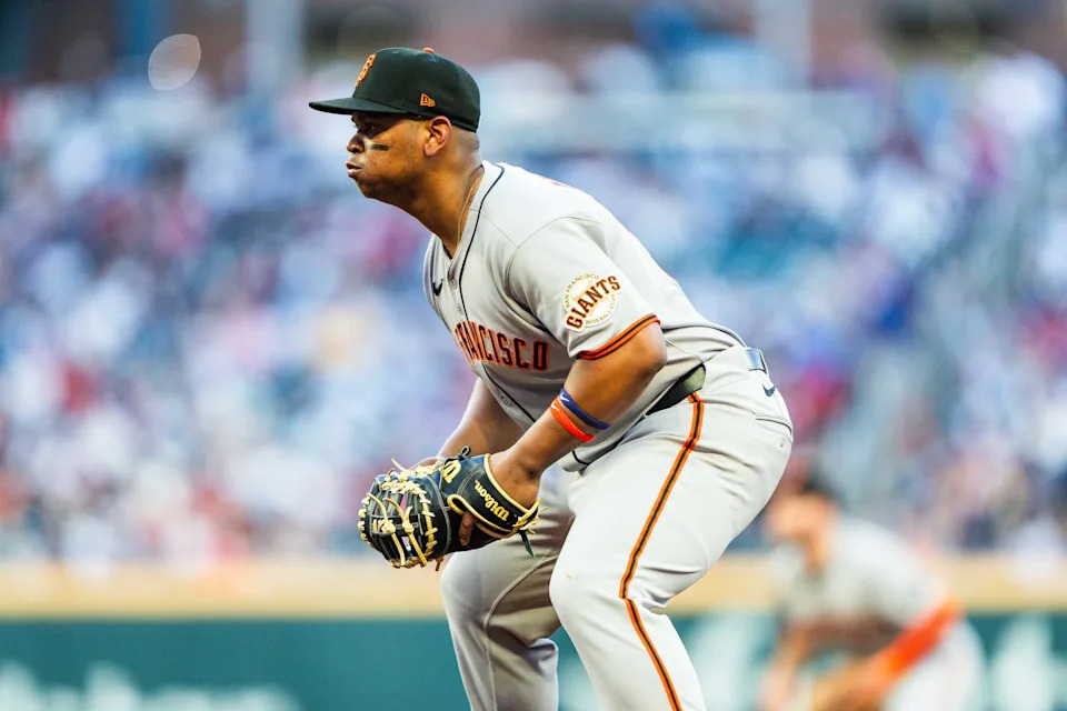 ATLANTA, GA - JULY 22: Rafael Devers #16 of the San Francisco Giants is positioned at first base during the third inning of the game against the Atlanta Braves at Truist Park on July 22, 2025, in Atlanta, Georgia. (Photo by Matthew Grimes Jr./Atlanta Braves/Getty Images)