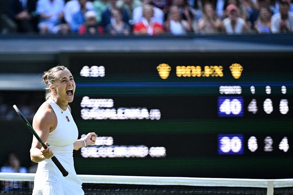 Belarus's Aryna Sabalenka celebrates after victory over Germany's Laura Siegemund during their women's singles quarter-final tennis match on the ninth day of the 2025 Wimbledon Championships at The All England Lawn Tennis and Croquet Club in Wimbledon, southwest London, on July 8, 2025. (Photo by Kirill KUDRYAVTSEV / AFP) / RESTRICTED TO EDITORIAL USE (Photo by KIRILL KUDRYAVTSEV/AFP via Getty Images)          