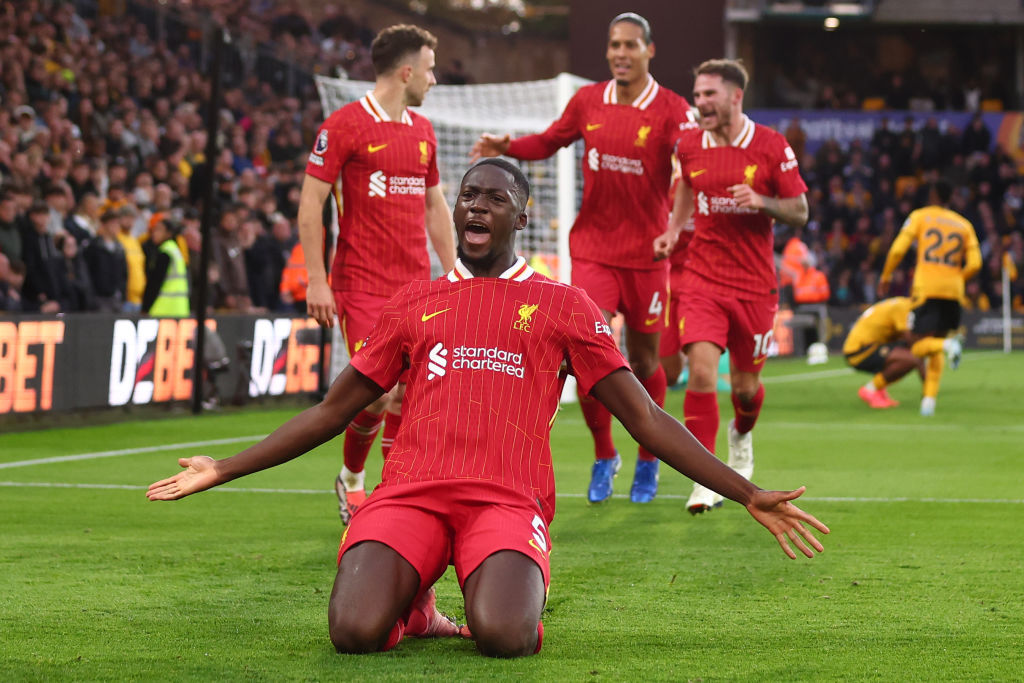 Ibrahima Konate of Liverpool celebrates scoring the first goal during the Premier League match between Wolverhampton Wanderers FC and Liverpool FC at Molineux on September 28, 2024 in Wolverhampton, England.