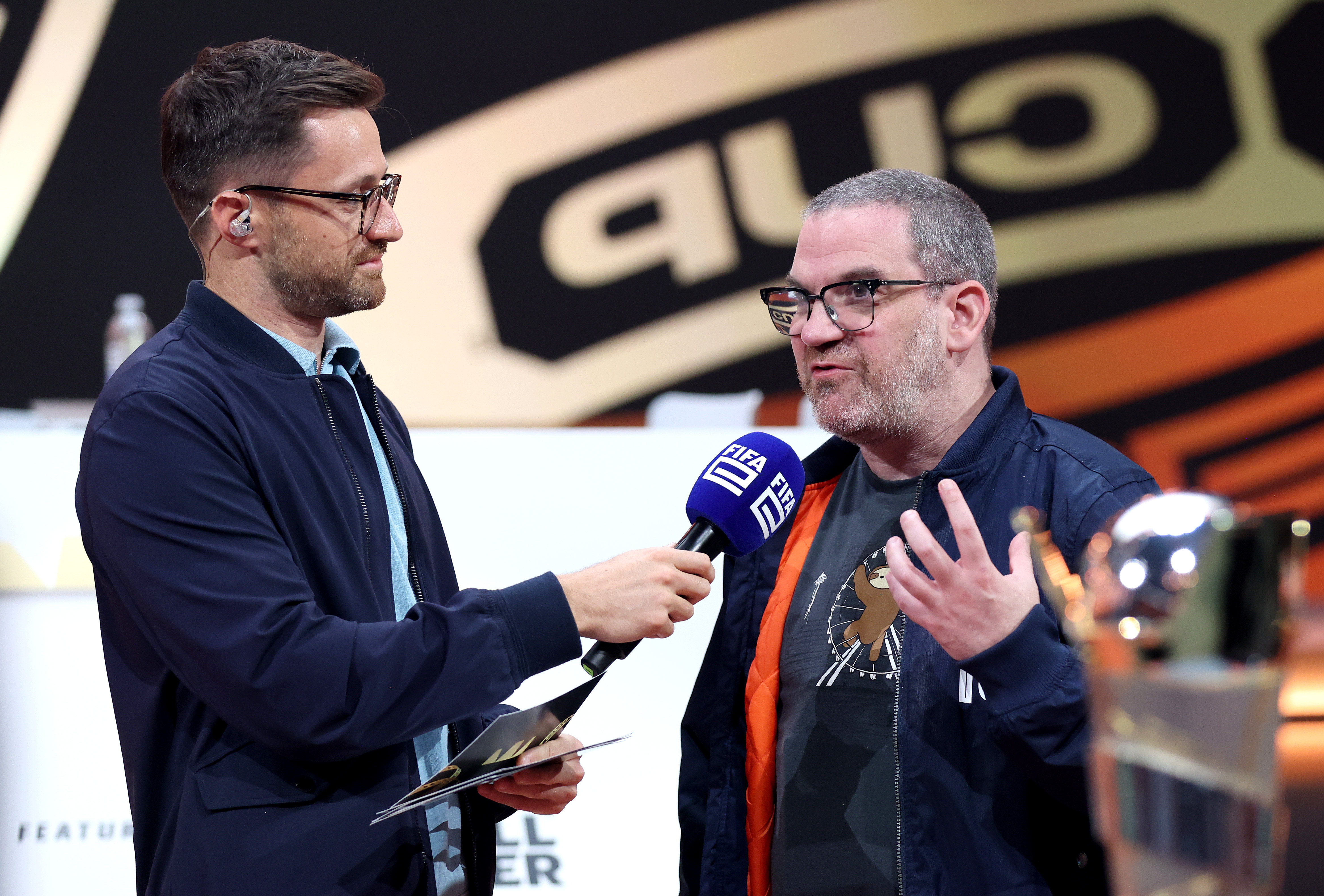 Sports Interactive's Miles Jacobson (R)