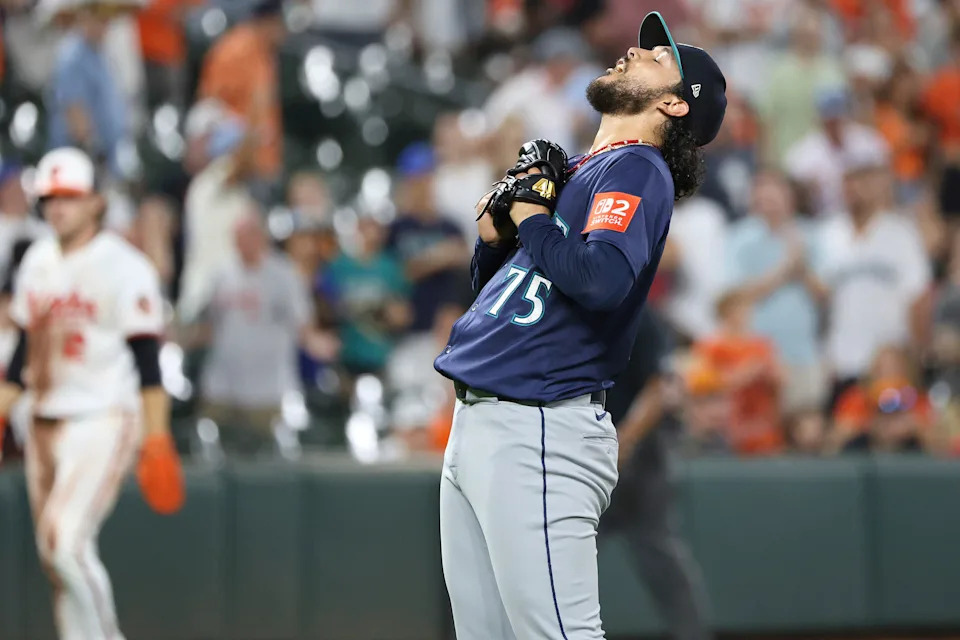 Seattle Mariners pitcher Andres Munoz celebrates after a baseball game against the Baltimore Orioles, Tuesday, Aug. 12, 2025, in Baltimore. (AP Photo/Daniel Kucin Jr.)
