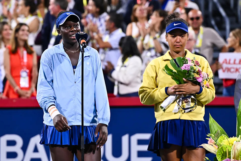 MONTREAL, CANADA - AUGUST 07: Victoria Mboko of Canada addresses the spectators following her victory against Naomi Osaka of Japan during the Women's Singles Final match on day twelve of the WTA 1000 National Bank Open at IGA Stadium on August 7, 2025 in Montreal, Quebec, Canada.  (Photo by Minas Panagiotakis/Getty Images)