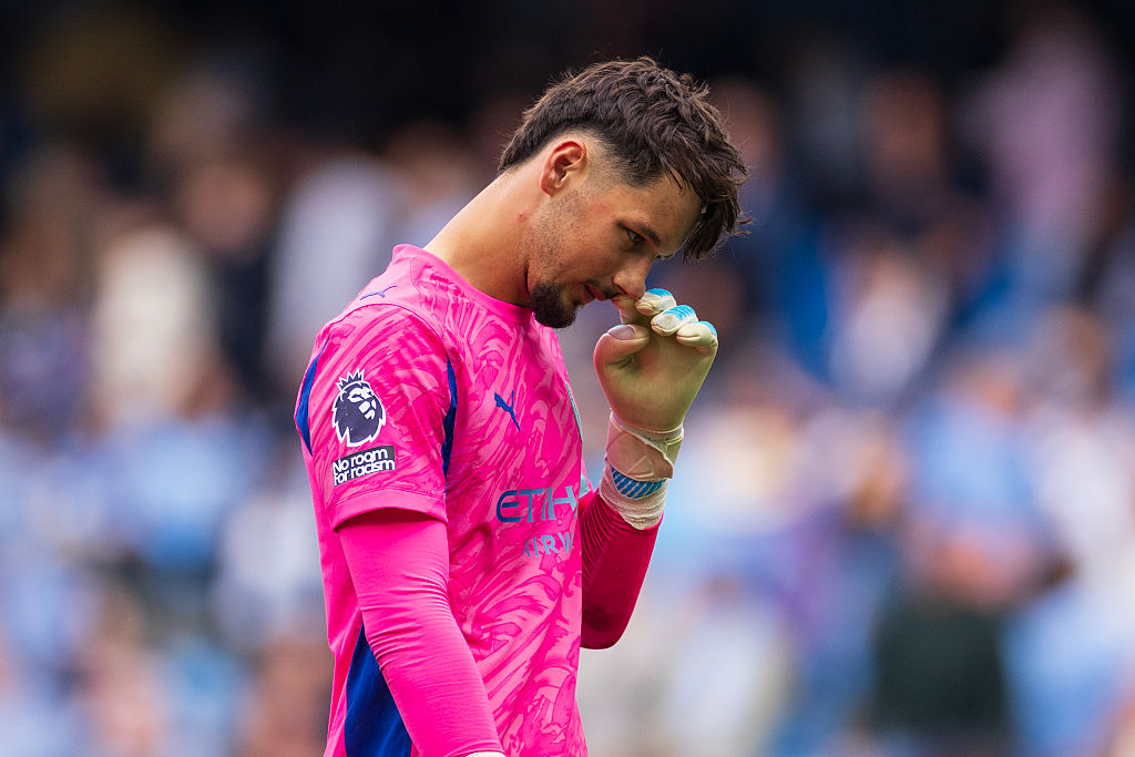 James Trafford of Manchester City looks dejected during the Premier League match between Manchester City and Tottenham Hotspur at Etihad Stadium on August 23, 2025 in Manchester, England.