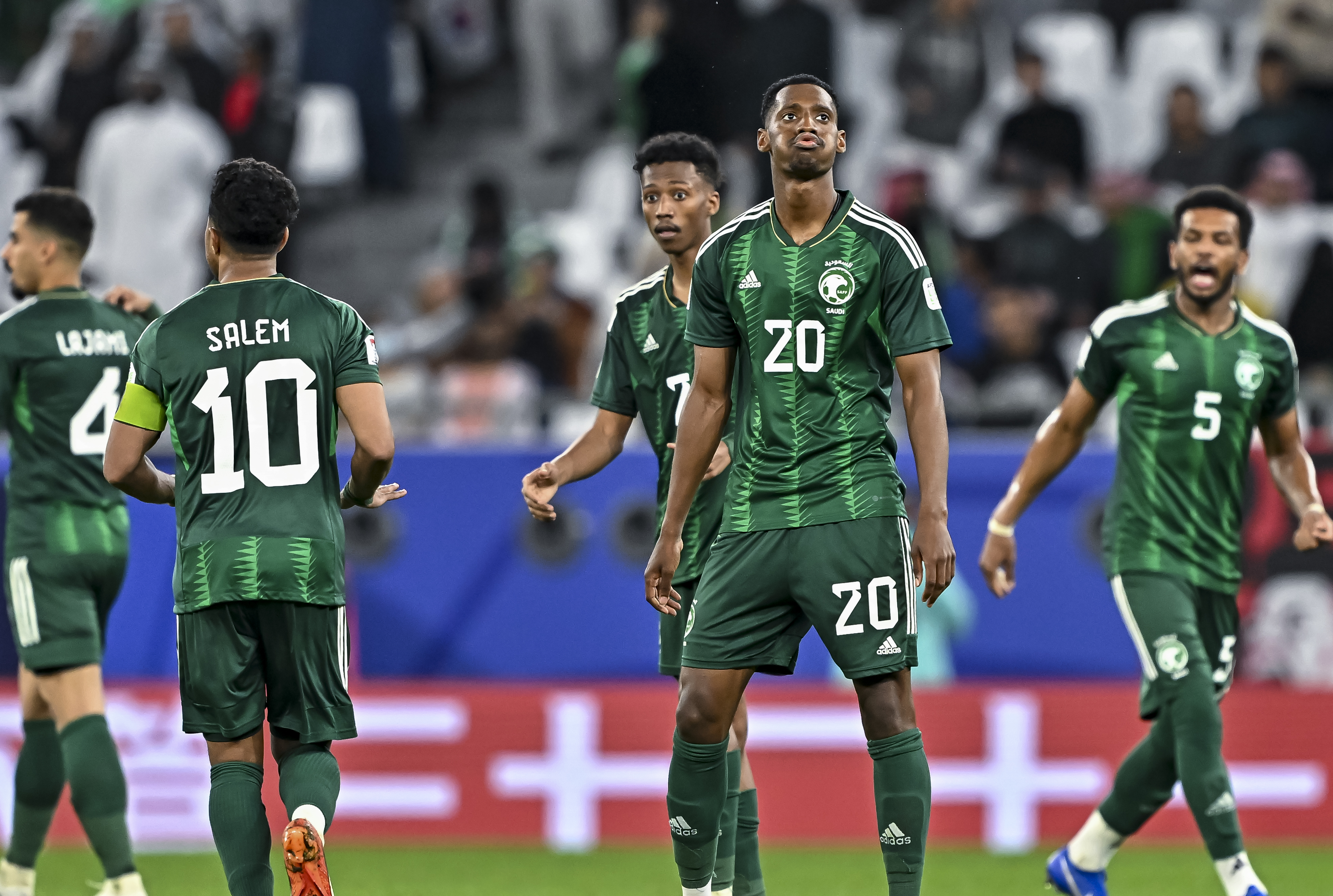 Saudi Arabia players celebrate a goal against South Korea at the 2023 Asian Cup.