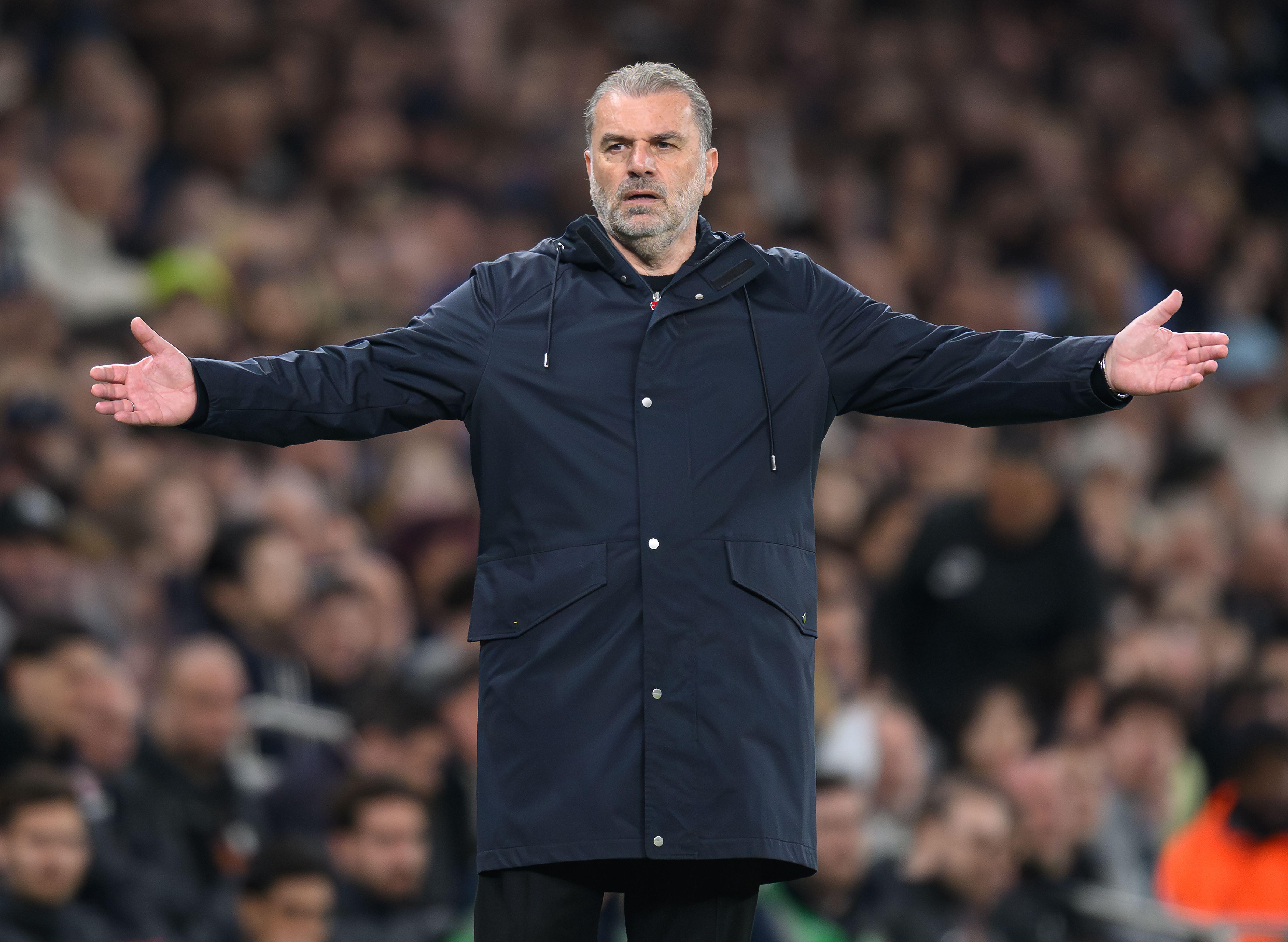 Tottenham Hotspur head coach Ange Postecoglou gestures with his arms spread during the Europa League match against Eintracht Frankfurt, April 2025.