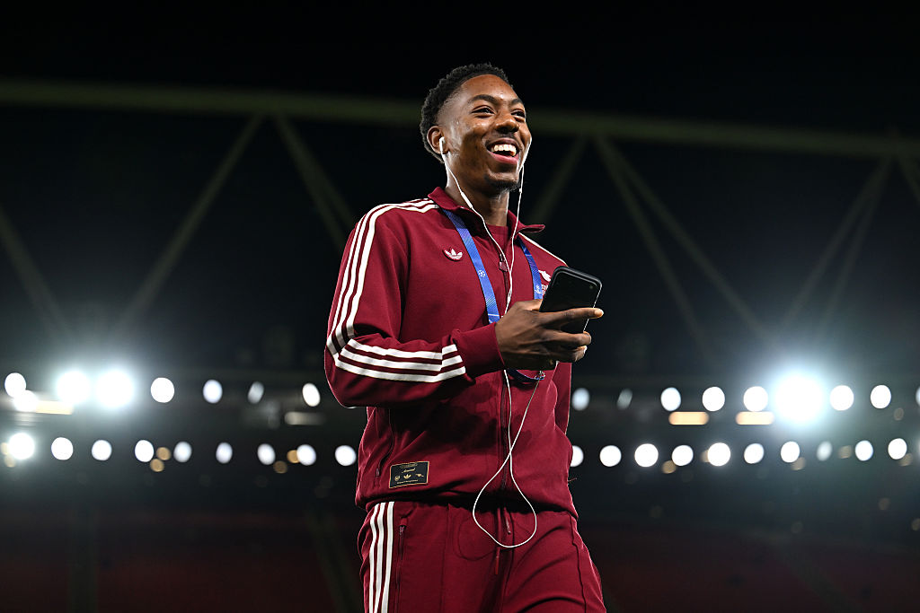 Myles Lewis-Skelly of Arsenal inspects the pitch prior to the UEFA Champions League 2025/26 League Phase MD3 match between Arsenal FC and Atletico de Madrid at Arsenal Stadium on October 21, 2025 in London, England.
