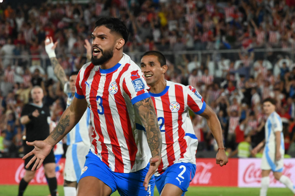 Paraguay's defender #03 Omar Alderete celebrates after scoring during the 2026 FIFA World Cup South American qualifiers football match between Paraguay and Argentina at the Ueno Defensores del Chaco stadium in Asuncion on November 14, 2024.
