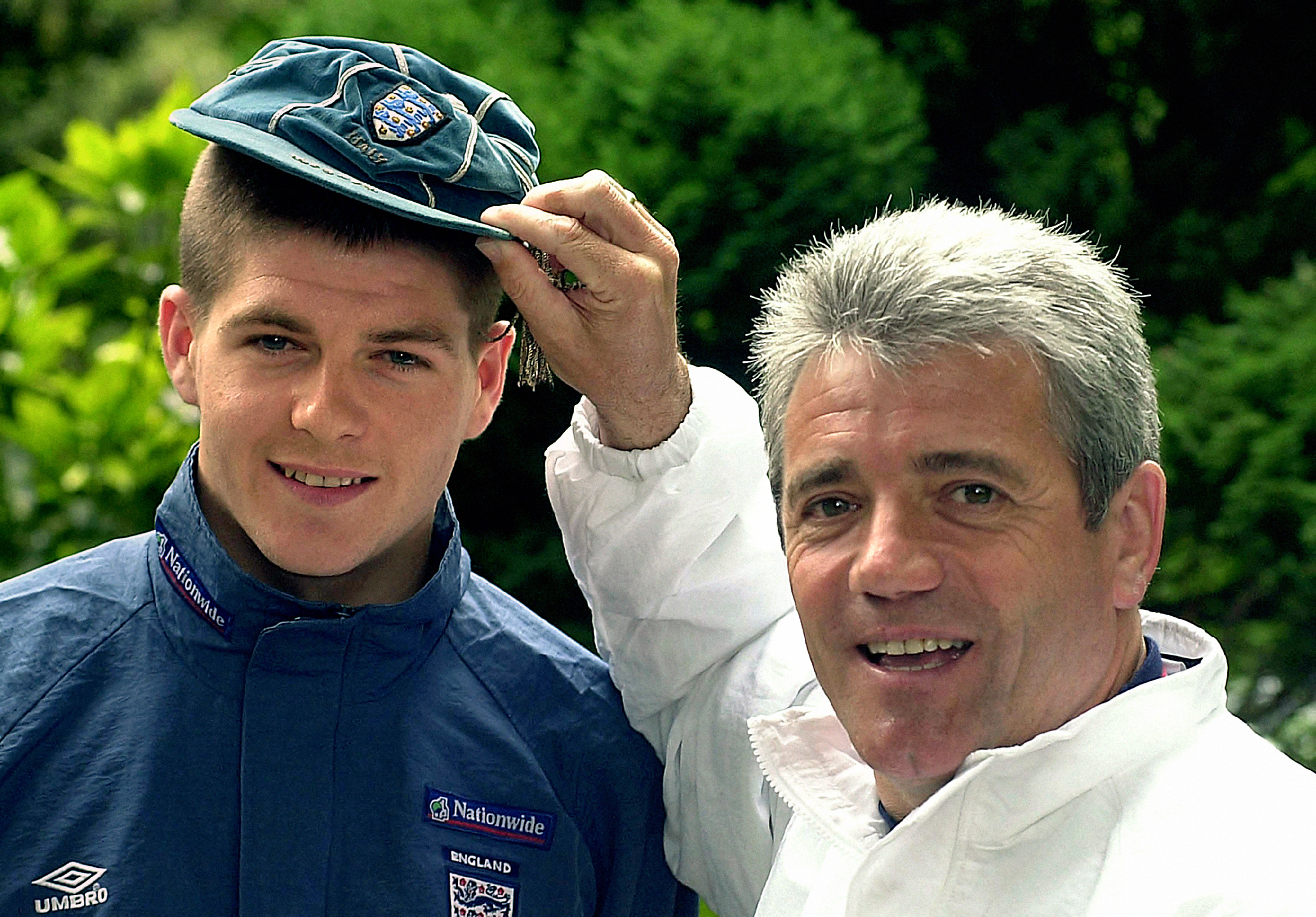 Kevin Keegan places a cap on Steven Gerrard before his England debut against Ukraine in May 2000