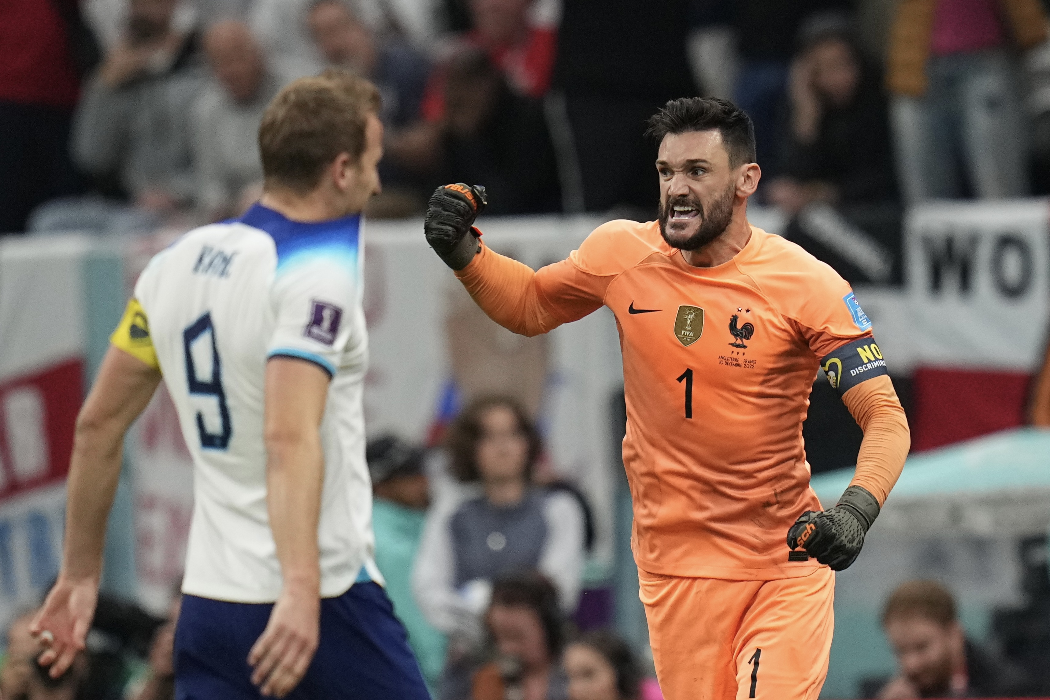England captain Harry Kane laments his penalty miss as France goalkeeper Hugo Lloris celebrates at the 2022 World Cup.