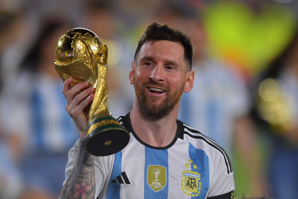 Lionel Messi of Argentina celebrates with the FIFA World Cup trophy during celebrations after an international friendly match between Argentina and Panama at Estadio M&aacute;s Monumental Antonio Vespucio Liberti on March 23, 2023 in Buenos Aires, Argentina.