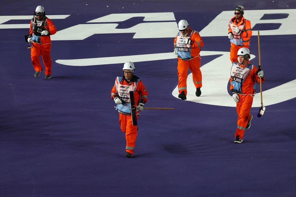 Marshals clean up debris on track