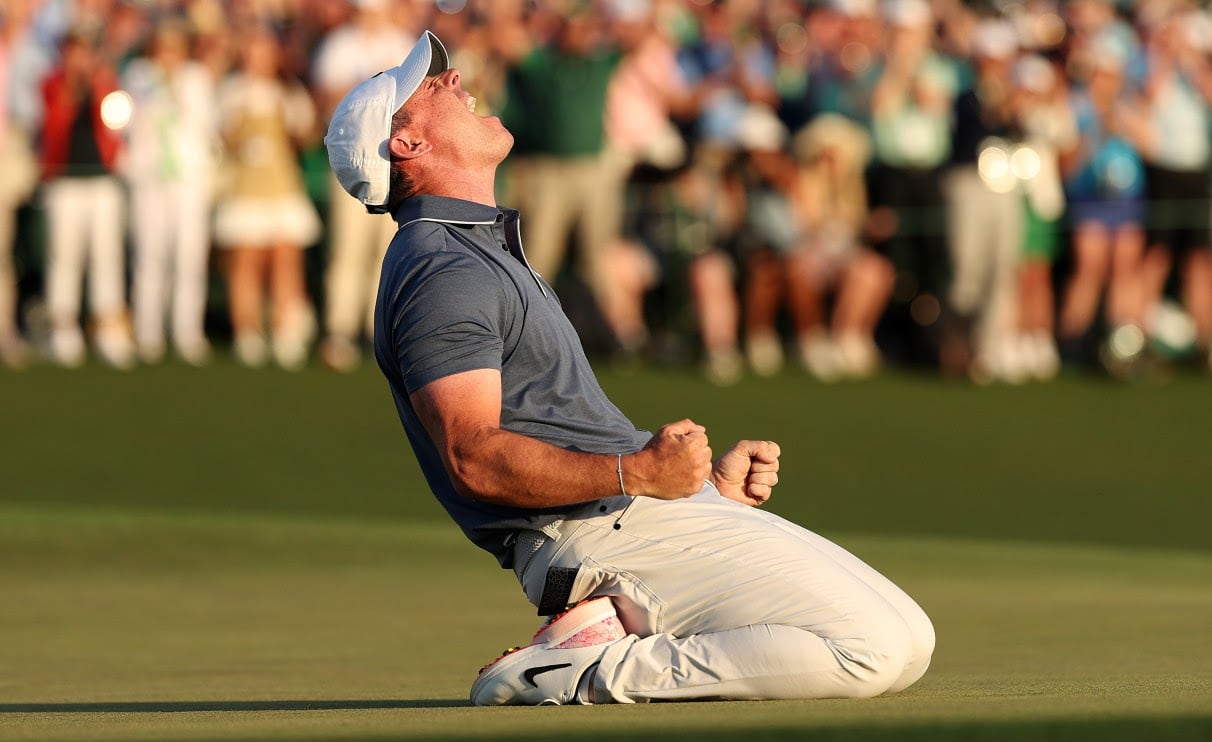 A men's golfer celebrates.