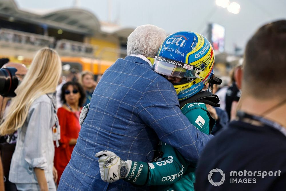 Fernando Alonso, Aston Martin F1 Team, hugs Lawrence Stroll, Owner, Aston Martin F1 Team, on the grid