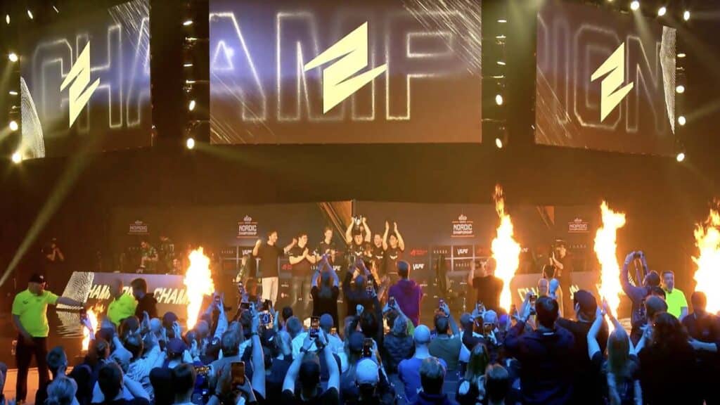 Image of ECSTATIC Counter-Strike team standing on stage at esports event