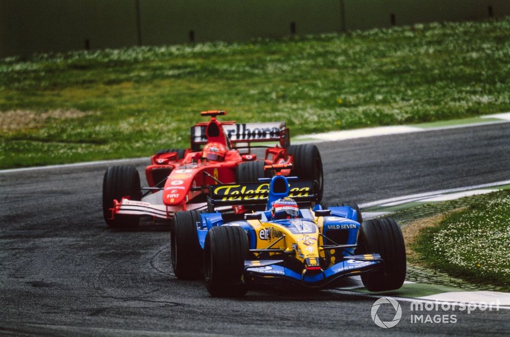 Fernando Alonso leading Michael Schumacher in 2005, when cars weighed 605kg