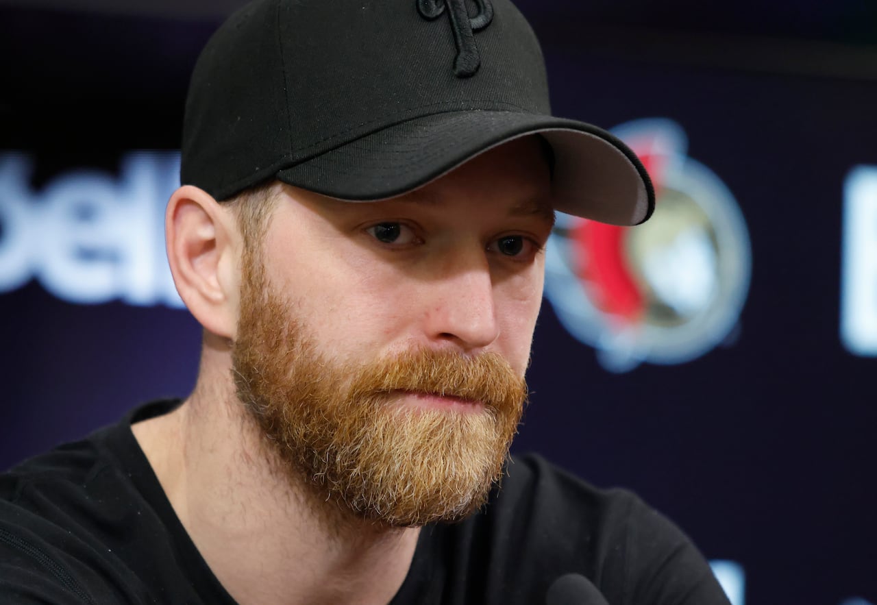 Claude Giroux speaks at a presser