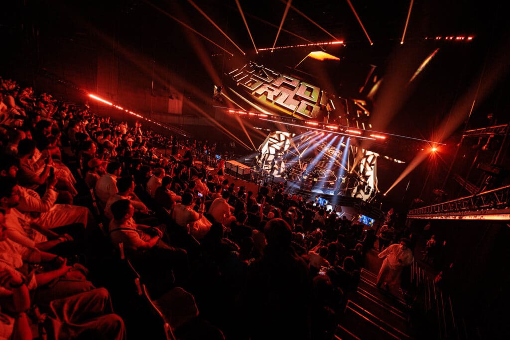 Image of Esports World Cup 2025 stage illuminated by lighting