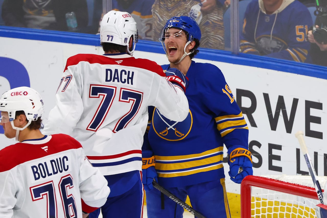 Kirby Dach (77), center for the Montreal Canadiens, and Peyton Krebs (19), center for the Buffalo Sabres