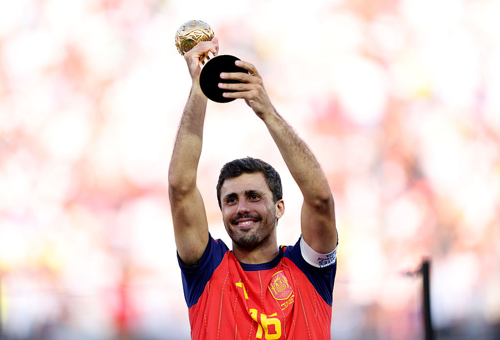 Rodri holding the Golden Ball trophy during the 2026 World Cup