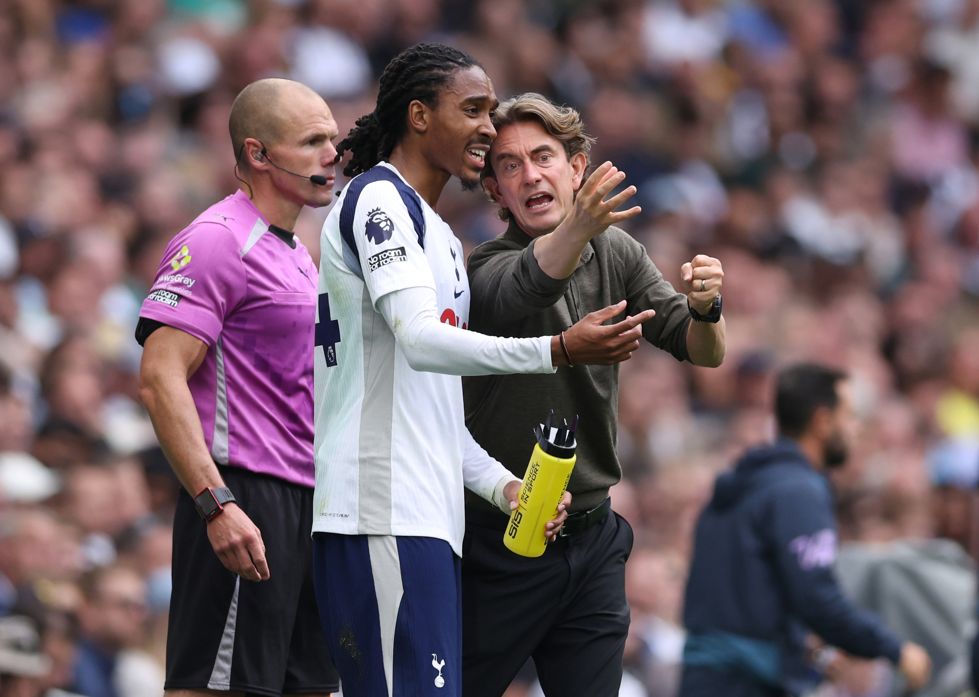 Thomas Frank manager / head coach of Tottenham Hotspur speaks with Djed Spence of Tottenham Hotspur during the Premier League match between Tottenham Hotspur and Bournemouth