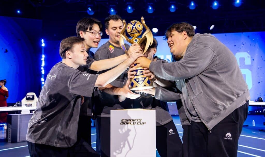 Image of team lifting trophy at EWC.