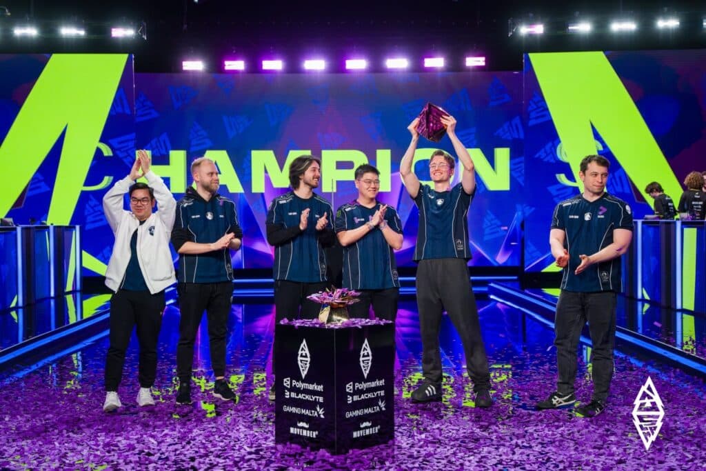 Picture of Team Liquid Dota 2 team lifting a trophy at BLAST.