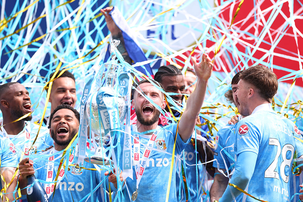 Players from Coventry City celebrate their return to top-flight football