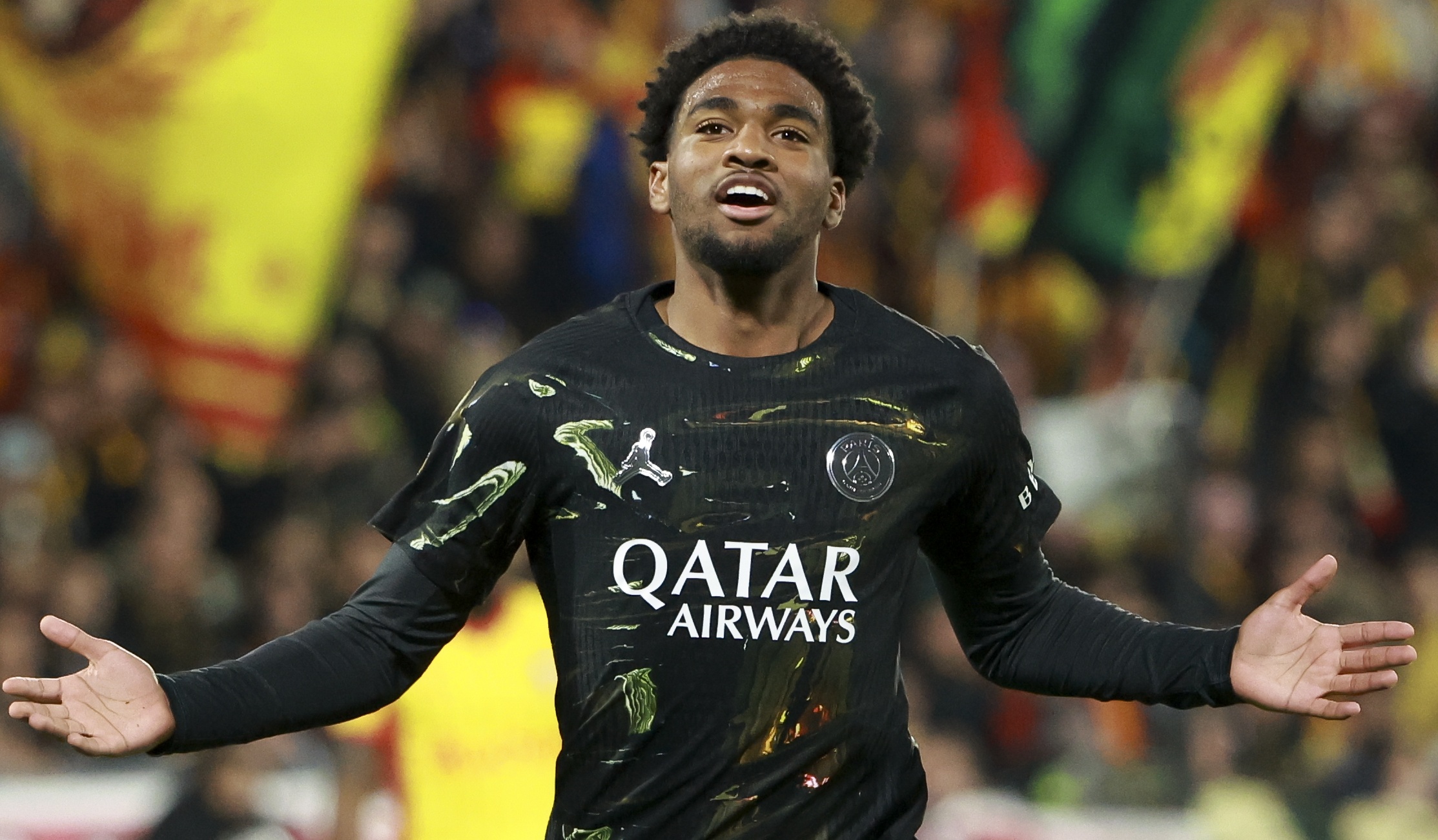 PSG's Ibrahim Mbaye celebrates scoring in a Ligue 1 game against RC Lens at Stade Bollaert-Delelis on May 13, 2026