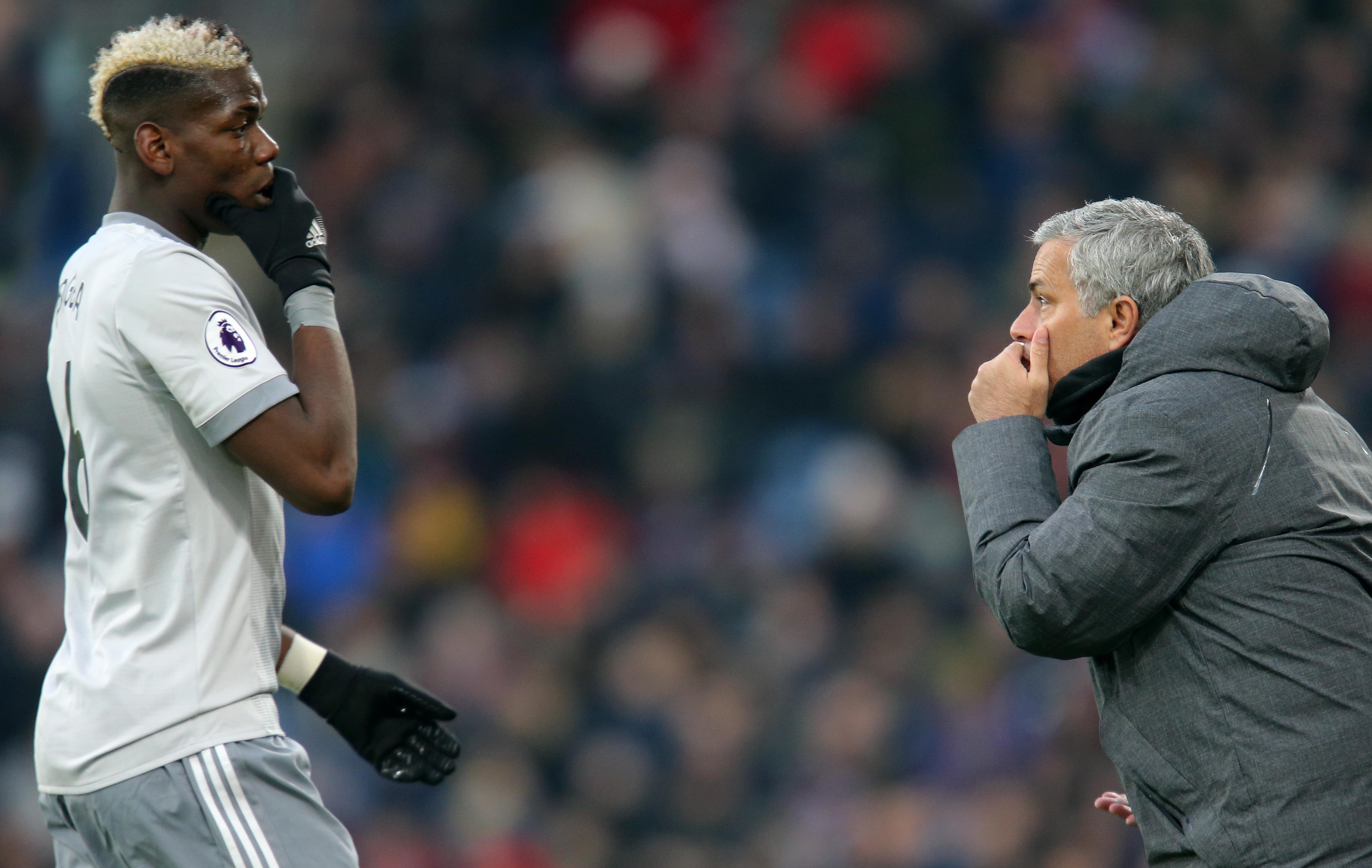Paul Pogba of Manchester United in conversation with Jose Mourinho in January 2018 during a match against Burnley