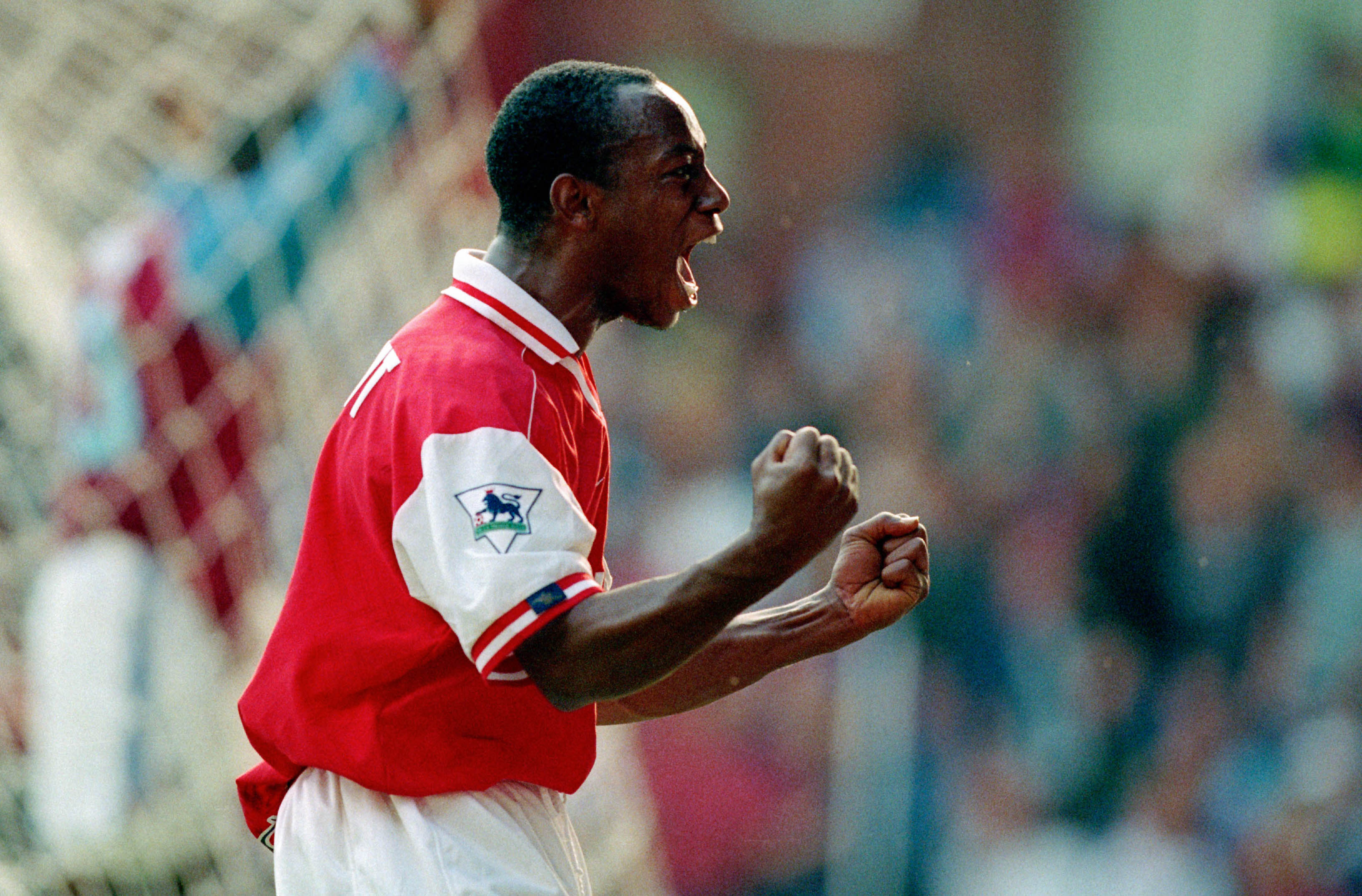Ian Wright celebrating after scoring for Arsenal vs Aston Villa back in September 1996.