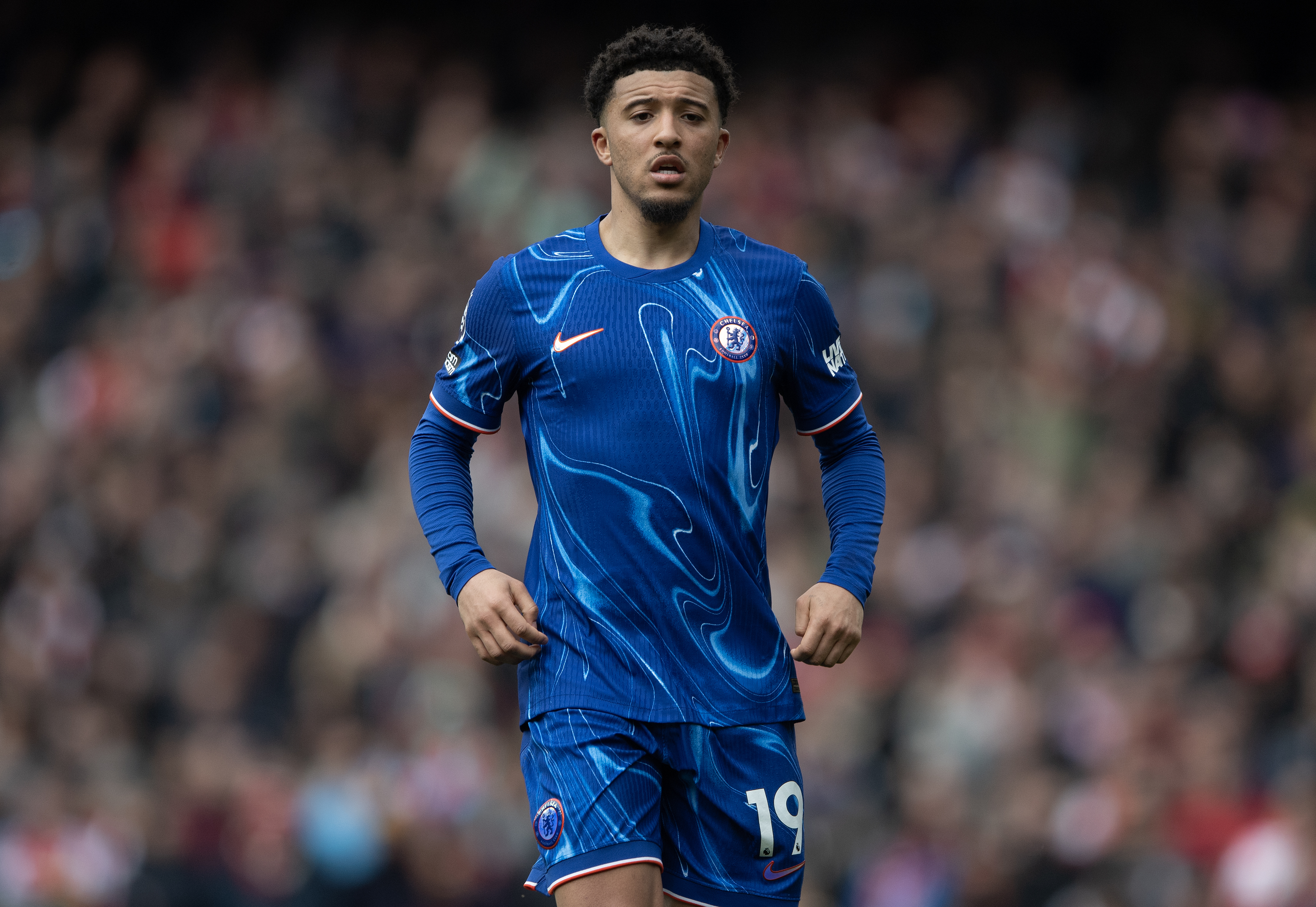 Chelsea winger Jadon Sancho running.
