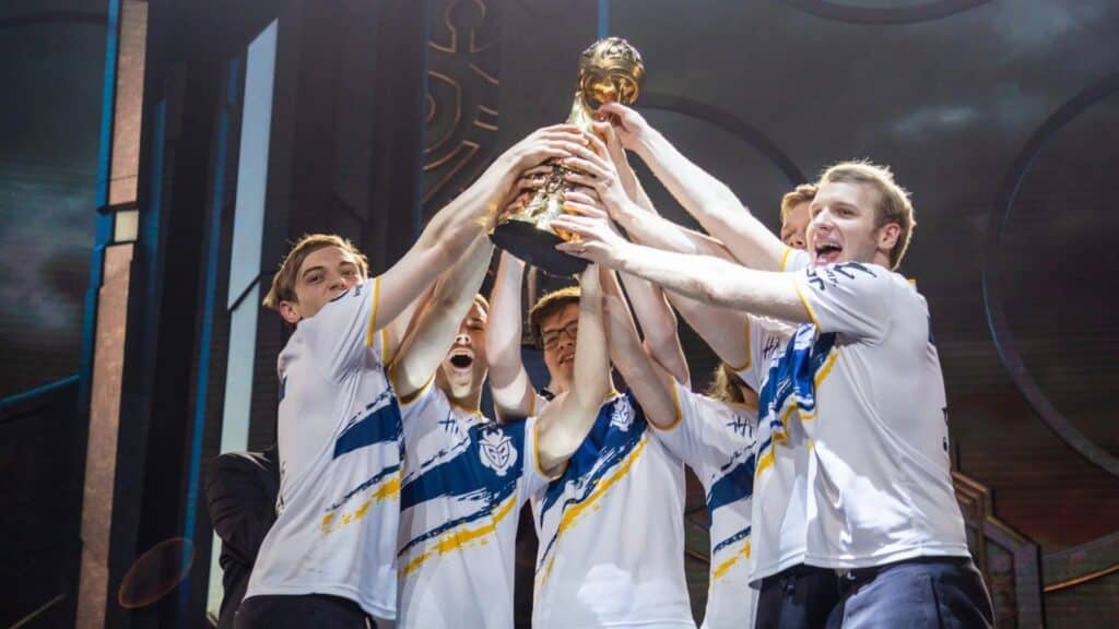 The members of G2 Esports celebrating on stage after winning the Mid-Season Invitational trophy in May of 2019.