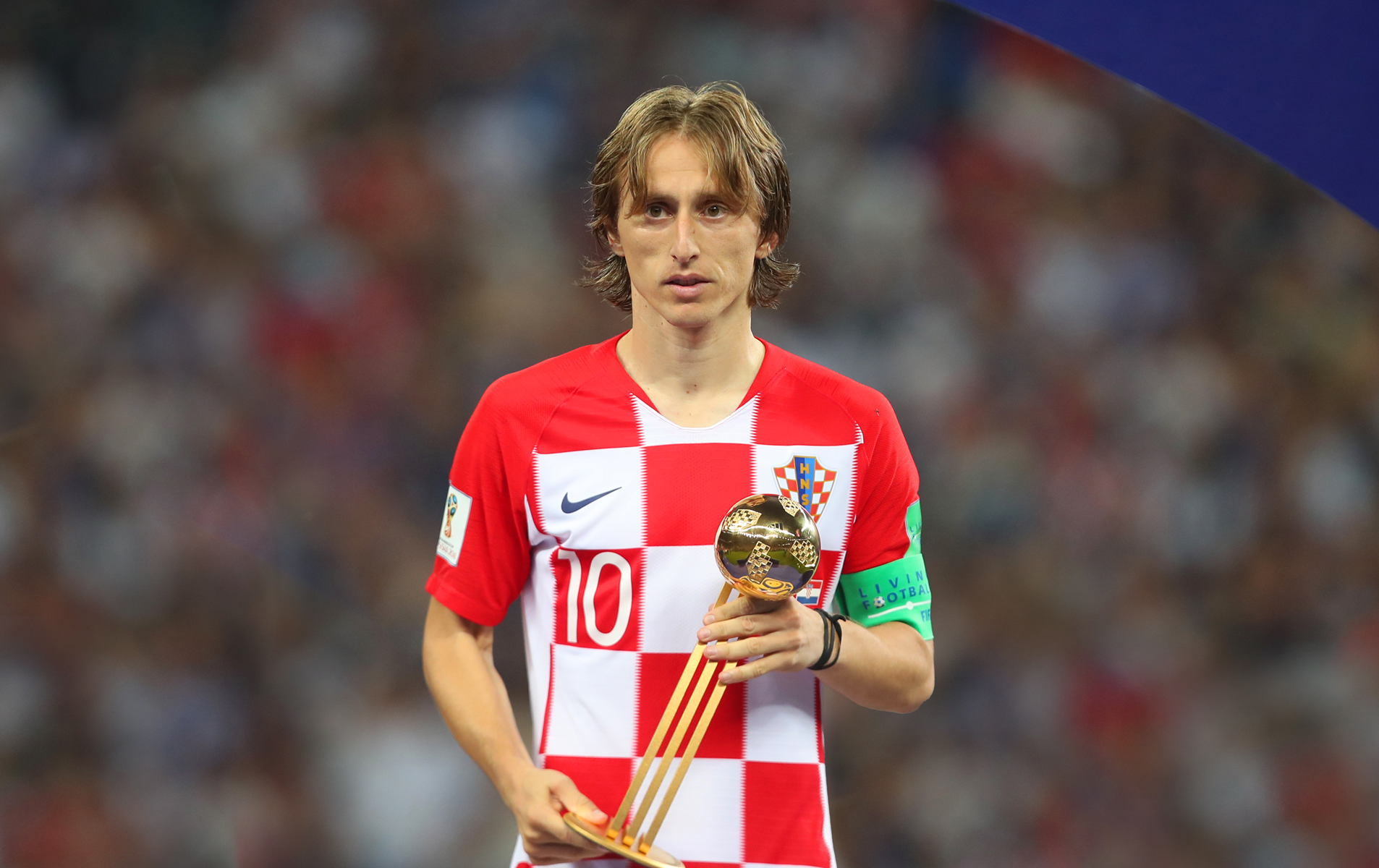 Luka Modric poses with his Golden Ball trophy after Croatia's defeat to France in the 2018 World Cup final in Moscow.