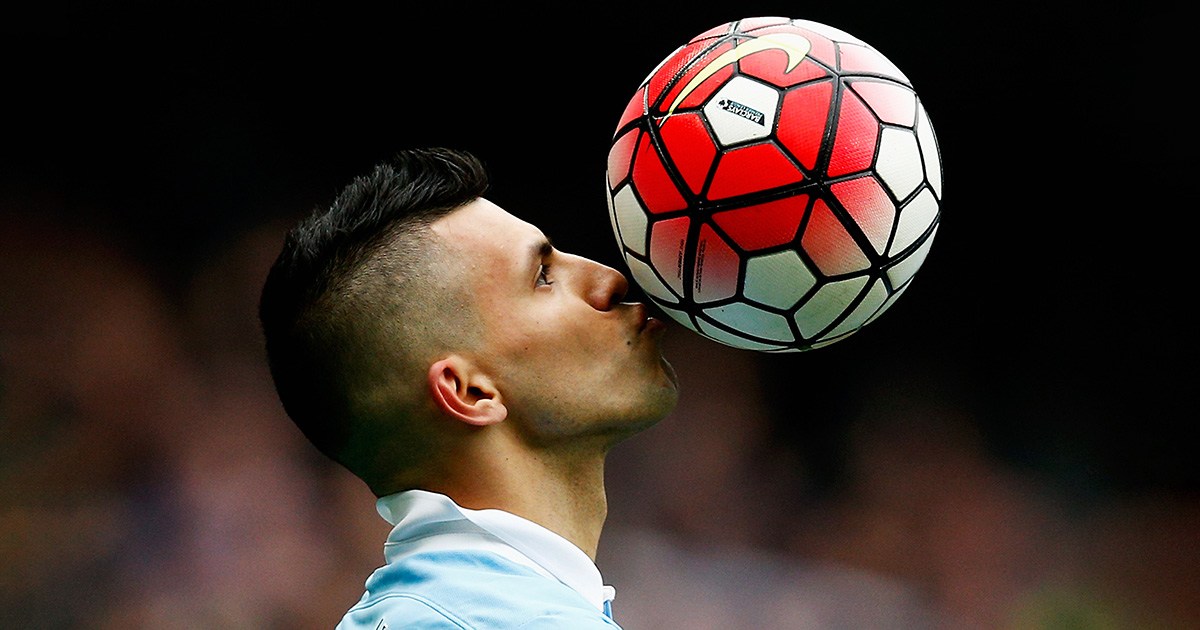 Manchester City's Sergio Aguero kisses the match ball as he celebrates scoring a hat-trick in a Premier League clash against Newcastle United at the Etihad Stadium on October 3, 2015.