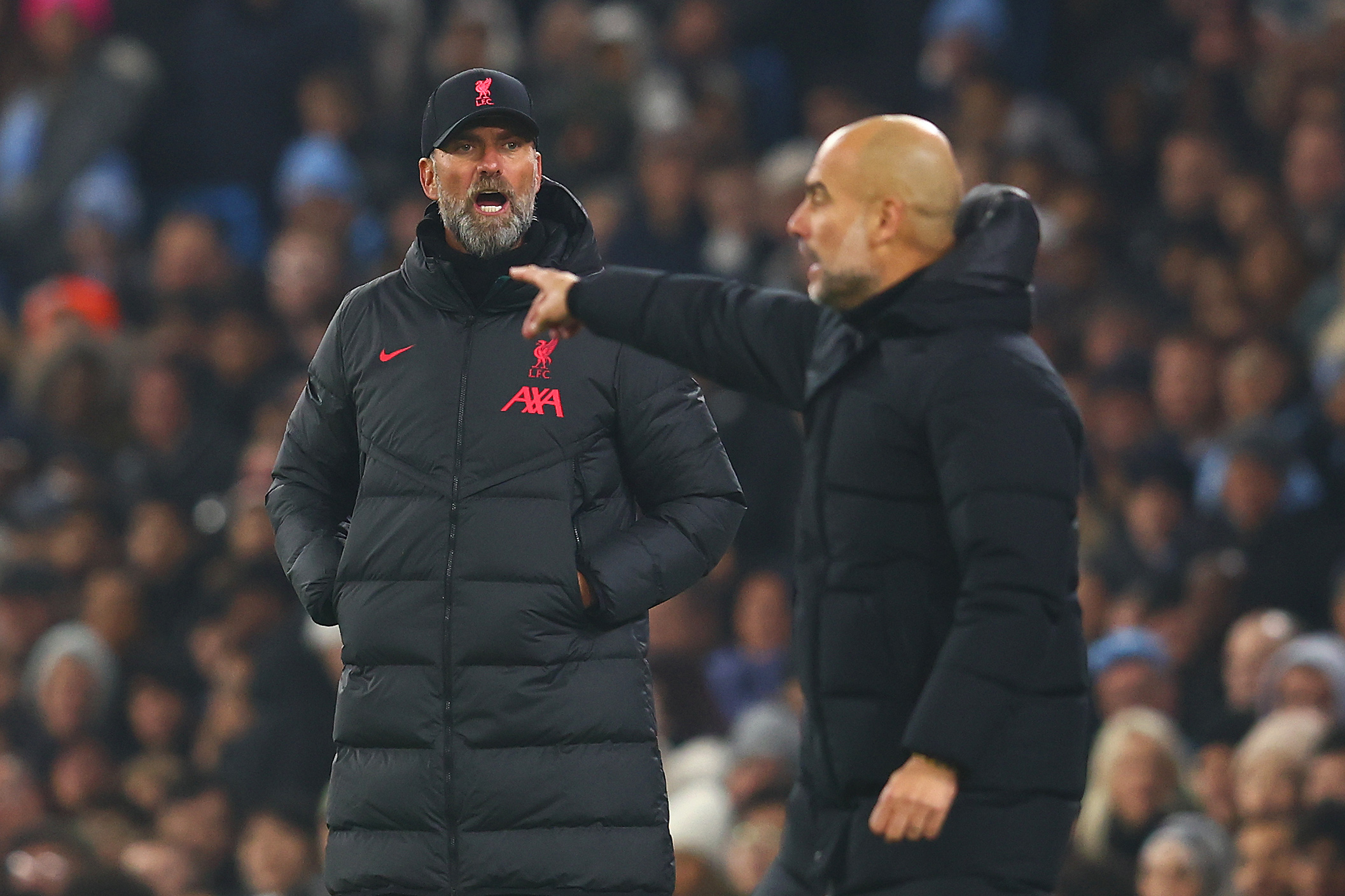 Liverpool Manager Jurgen Klopp reacts to Manchester City Manager Pep Guardiola