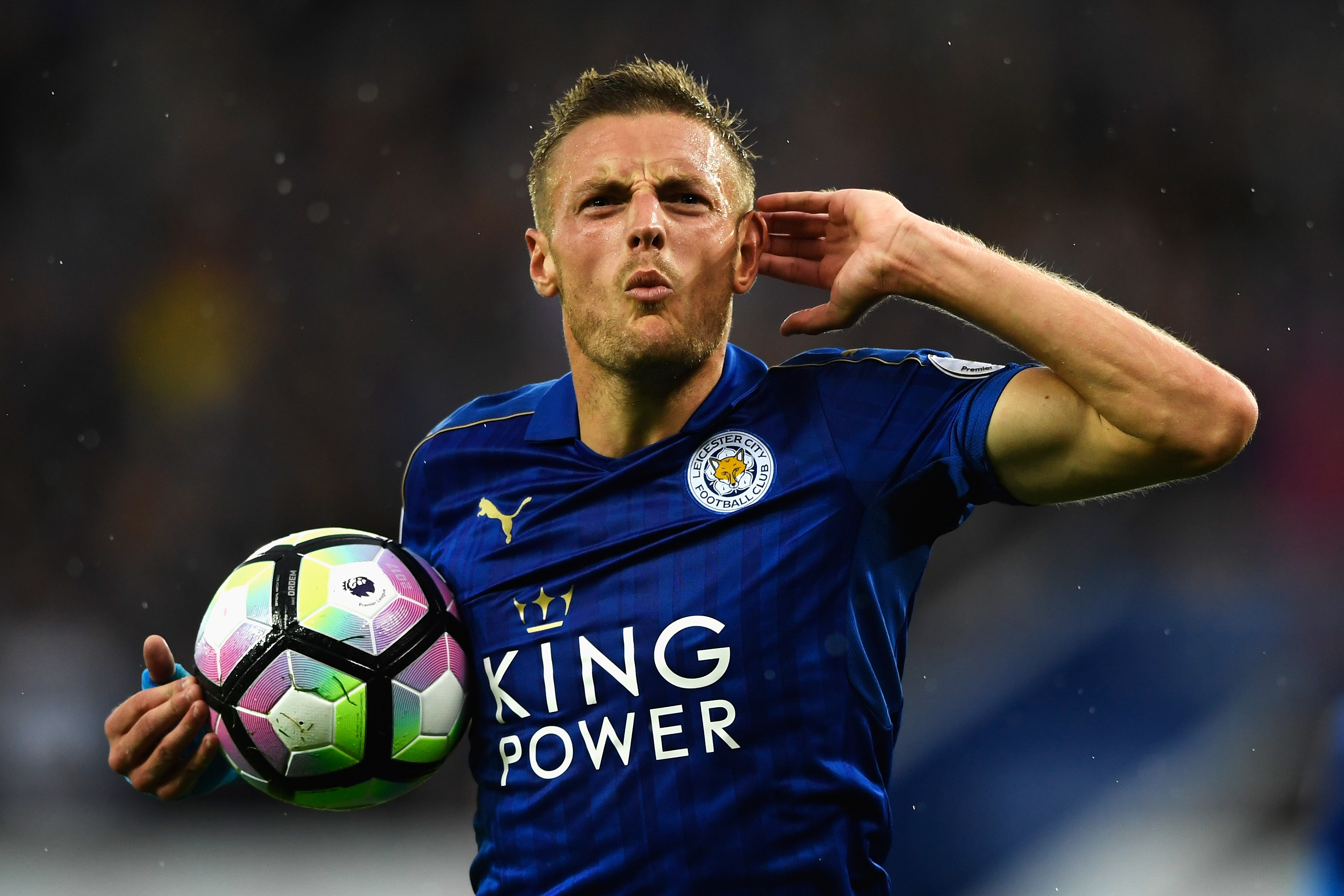 Jamie Vardy celebrates after scoring for Leicester City against Swansea City in August 2016, cupping his hand to his ear.