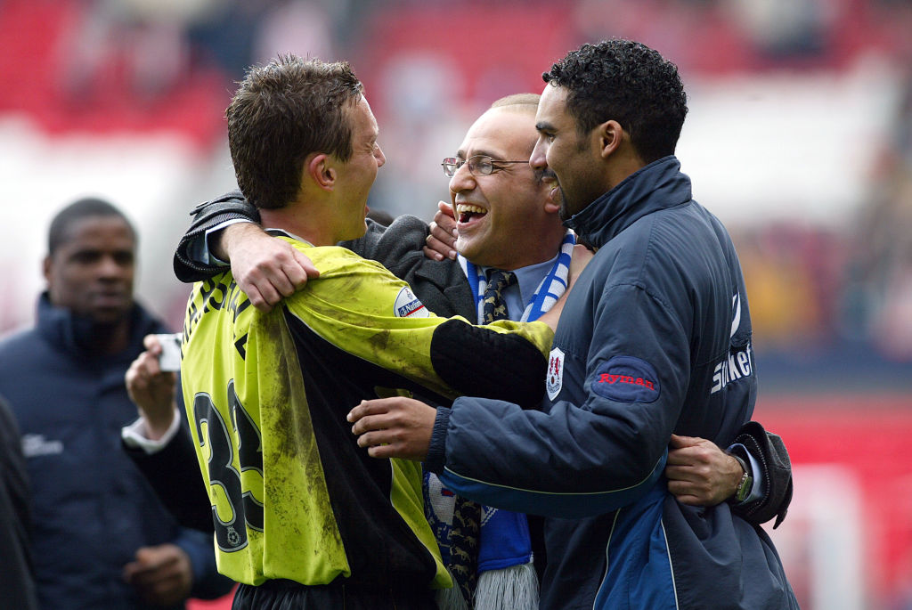 MANCHESTER, ENGLAND - April 3: Andy Marshall, Theo Paphitis Chairman of Millwall and Paul Ifill of Millwall celebrate after winning the FA Cup Semi Final match between Sunderland and Millwall at Old Trafford on April 3, 2004 in Manchester, England. (Photo by Michael Mayhew/Sportsphoto/Allstar via Getty Images) *** Local Caption ***Andy Marshall; Theo Paphitis; Paul Ifill