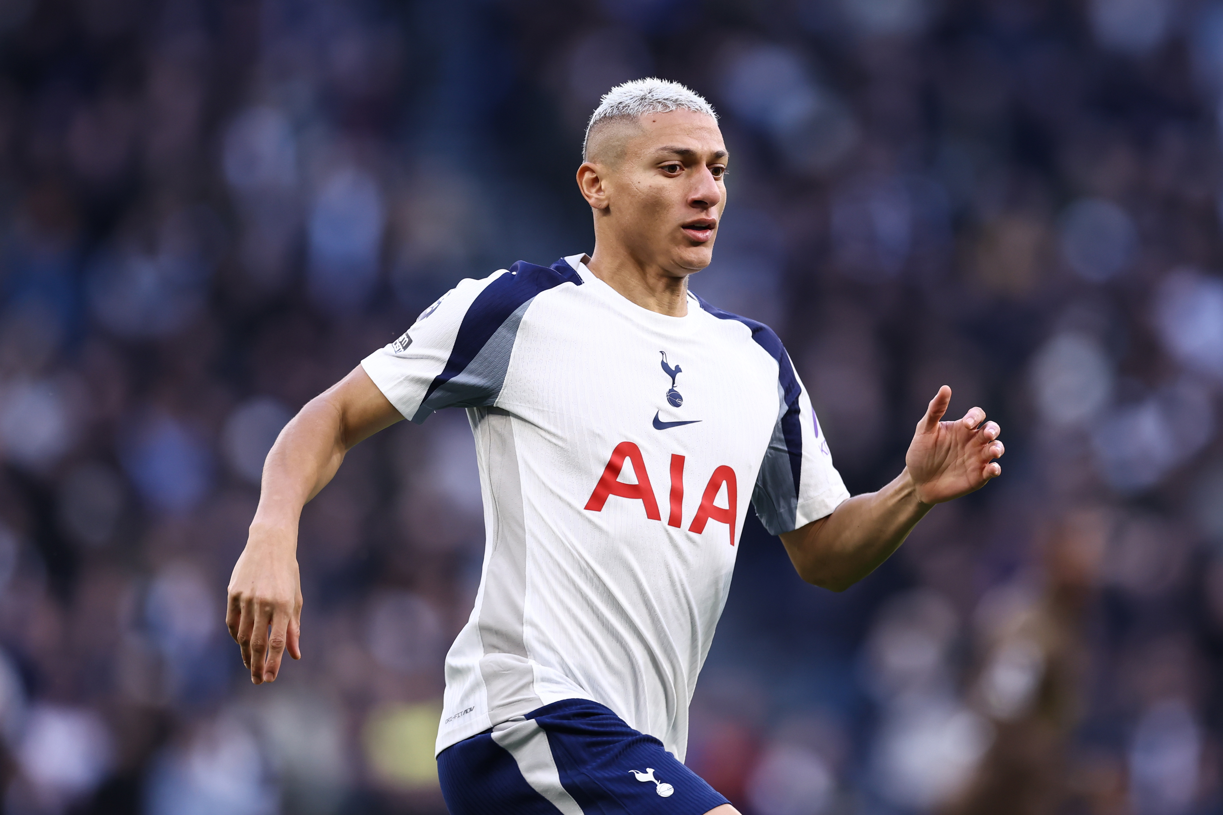 Tottenham forward Richarlison running.