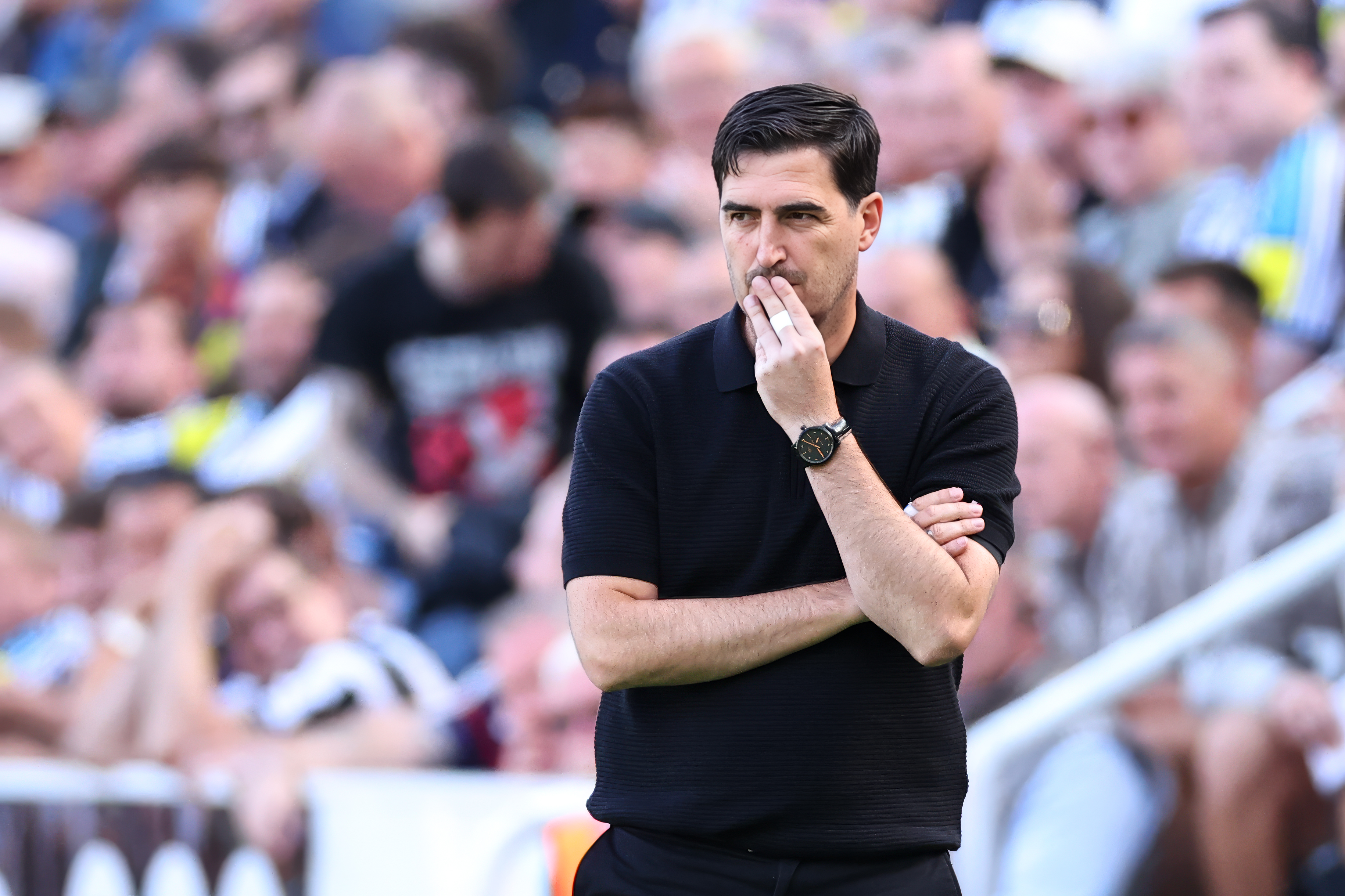Andoni Iraola looking pensive on the sidelines.