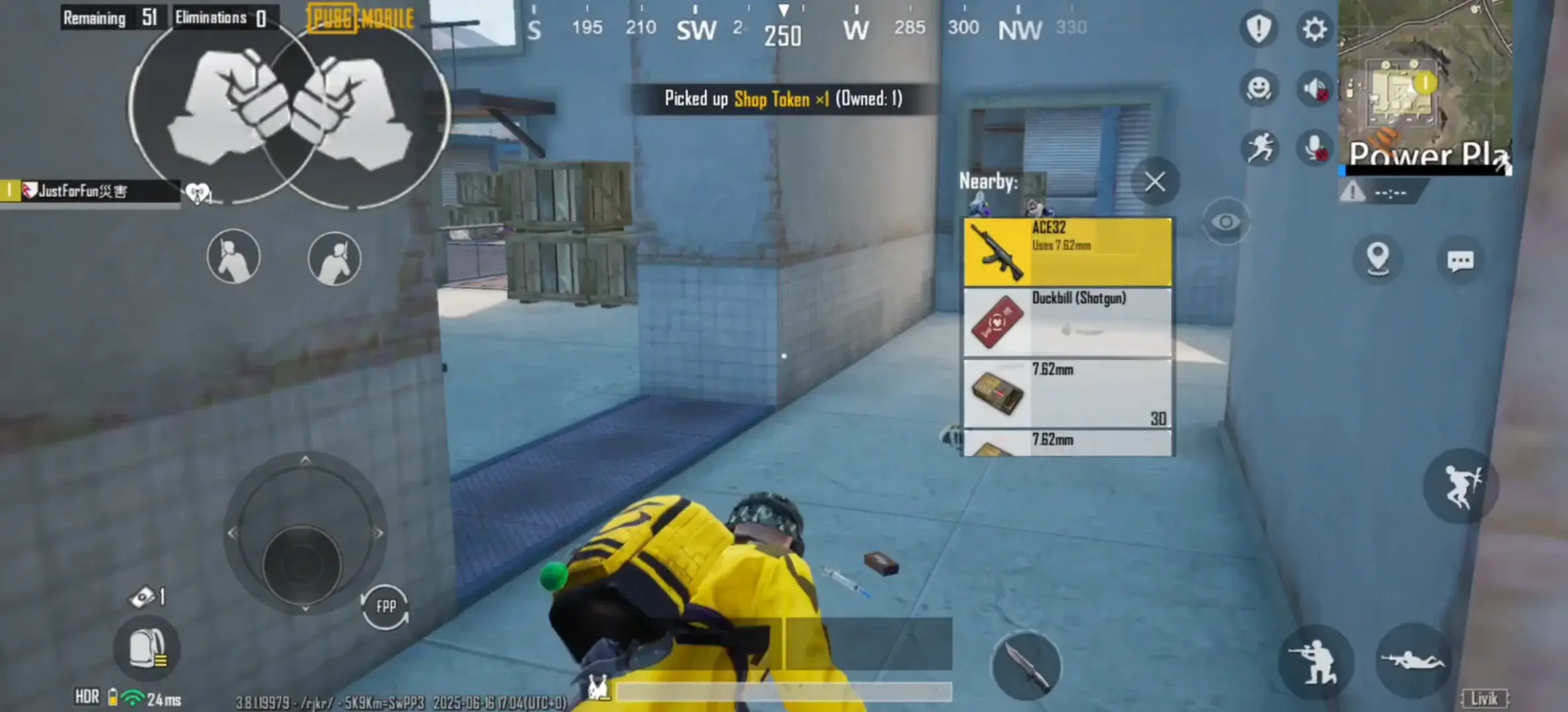 First-person perspective of a player in PUBG Mobile looking at a loot menu with weapons and ammunition.