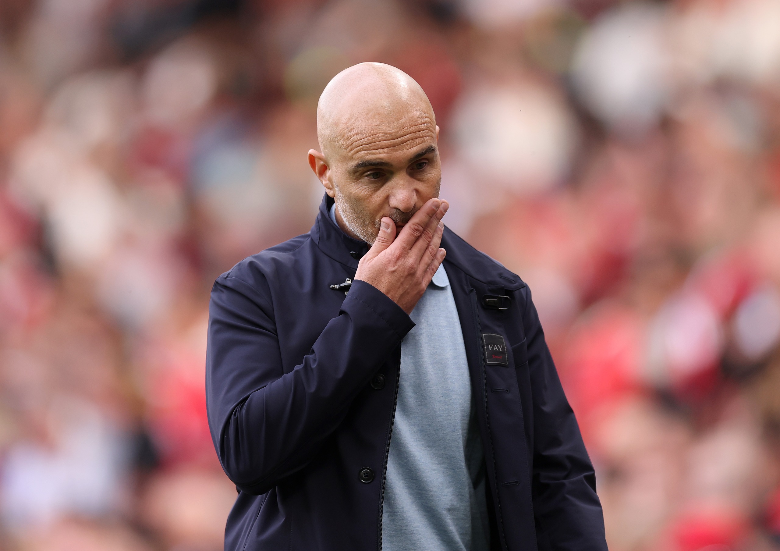 Manchester City head coach Enzo Maresca looking disappointed during a match