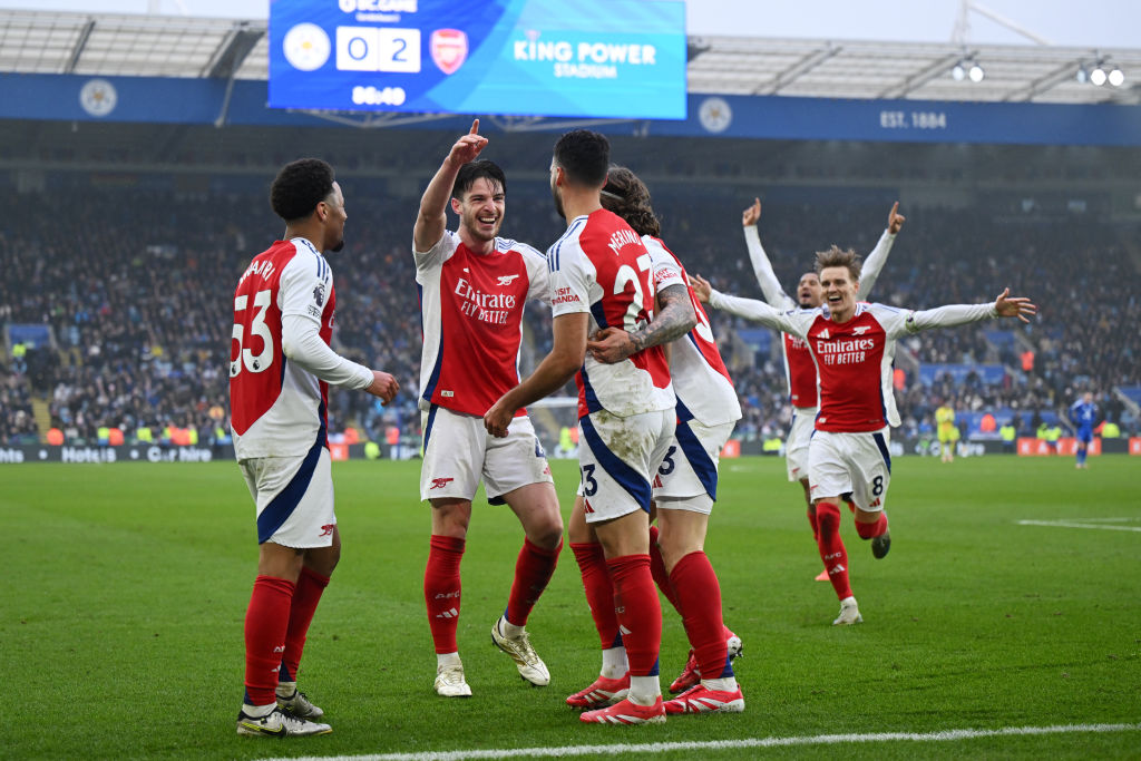 Mikel Merino of Arsenal celebrates scoring his team's second goal with teammates during the Premier League match between Leicester City and Arsenal